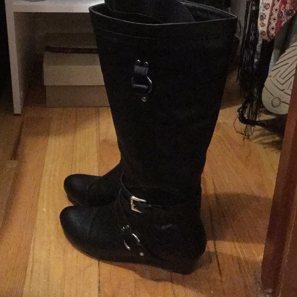 Black tall boots Sz 9 with silver buckle accent.